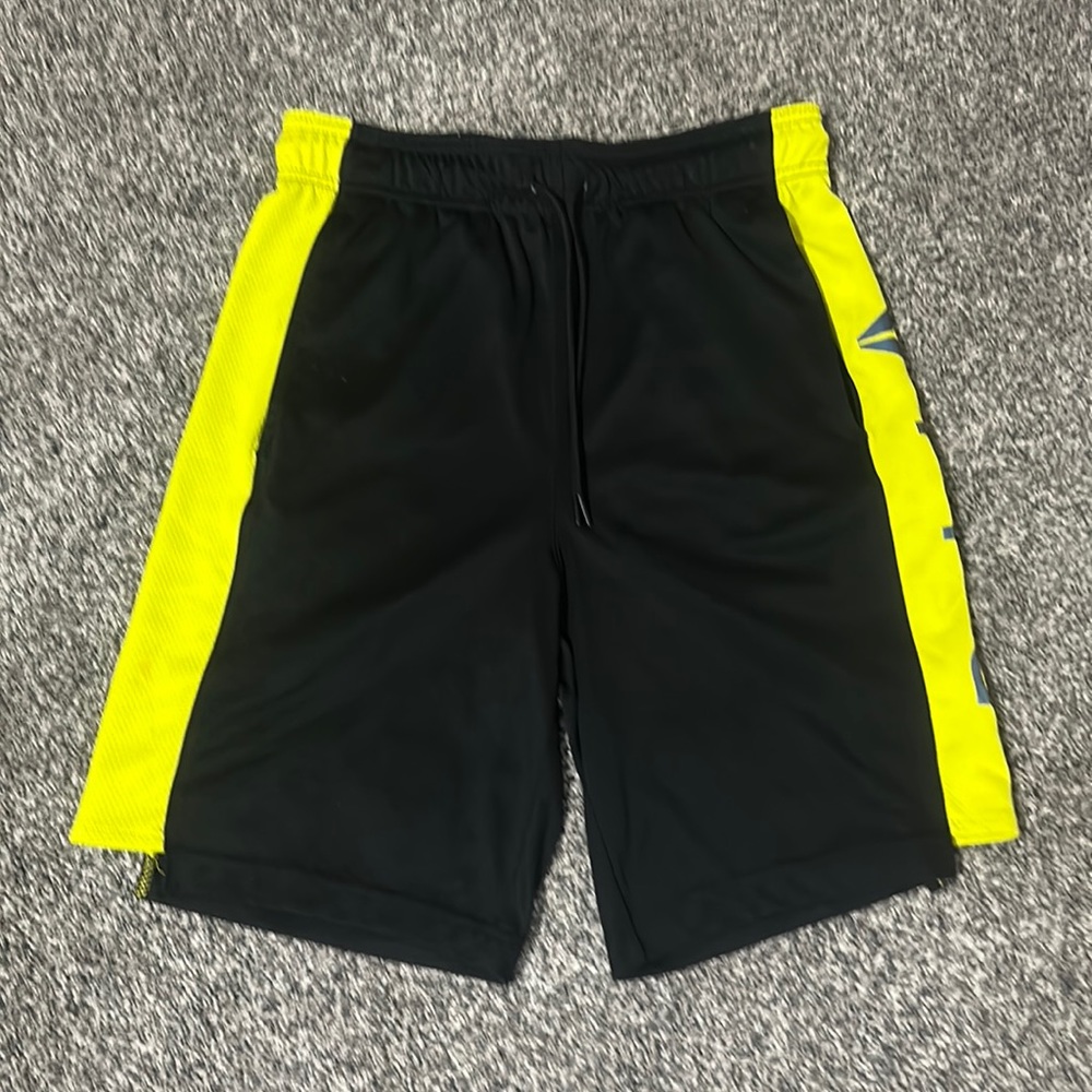 Brand: Reebok  Colors: Black and Green  Size: Men’s Small